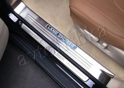 Toyota Land Cruiser 200 (08-) накладки на пороги дверных проемов, из нержавеющей стали с надписью Toyota, комплект 12 шт.