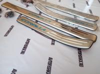 Toyota Corolla седан (01-06) накладки порогов дверных проемов из нержавеющей стали с подсветкой, комплект 4 шт.