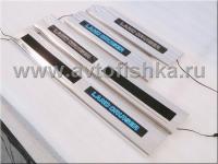 Toyota Land Cruiser 200 (08-) накладки порогов дверных проемов салона с подсветкой "Land Cruiser", нержавеющая сталь, комплект 4 шт.