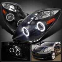 Toyota Yaris P2 (05-) передние фары линзовые черные, со светящимися ободками, комплект 2 шт.