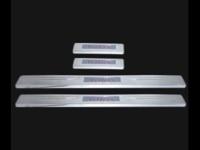 Toyota Yaris (05-) накладки порогов дверных проемов из нержавеющей стали с подсветкой, комплект 4 шт.