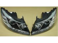 Skoda Octavia (08-) фары передние линзовые, черные, со светящимися ободками, с моторами корректора