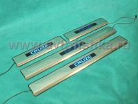 Chevrolet Cruze (08-) накладки порогов дверных проемов из нержавеющей стали с подсветкой, комплект 4 шт.