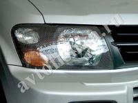 Защита передних фар карбон Mitsubishi Pajero 2000-2006