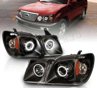 Lexus LX470 (98-07) фары передние линзовые черные, со светящимися ободками, комплект 2 шт.