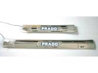 Toyota Land Cruiser Prado 120 (02-) накладки на пороги дверных проемов полированные, из нержавеющей стали с подсветкой Prado, комплект 4 шт.