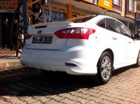 Ford Focus (11–) Спойлер на дверь багажника, грунт, седан