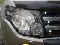 Защита передних фар с окантовкой Mitsubishi Pajero 4 2007-2020