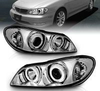 Nissan Maxima QX III A33 (00-06) фары передние линзовые со светящимися ободками, цвет хром