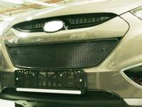 Защитная накладка с сеткой на решетку переднего бампера Chevrolet Cruse 2009-2013