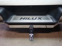 Toyota Hilux (15–) Накладка на задний бампер (лист шлифованный надпись HILUX)