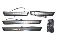 Toyota Camry 50 (2011-) накладки на пороги дверных проемов с подсветкой