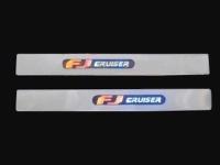 Toyota FJ Cruiser (07-) накладки порогов дверных проемов из нержавеющей стали с подсветкой "FJ cruiser", комплект 2 шт.