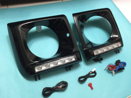 Mercedes G-class W463 (1989-2013) рамки передних фар с фонарями DRL, под покраску, полный установочный комплект