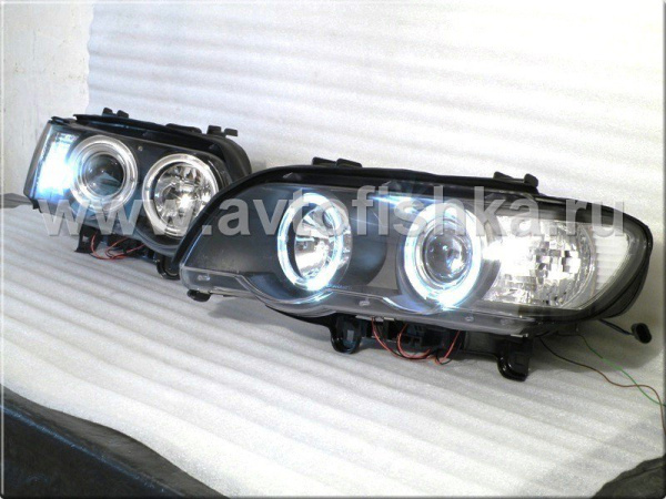 BMW X5 (98-03) фары передние линзовые черные, со светящимися ободками, с электрокорректором, комплект 2 шт.
