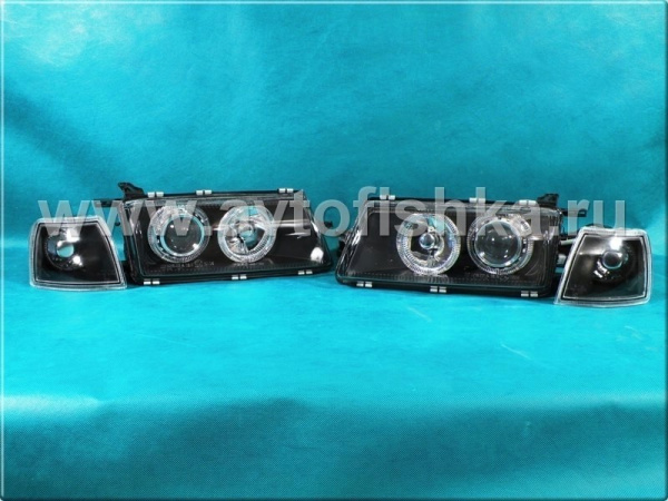 Opel Vectra A (89-95) фары передние линзовые черные, со светящимися ободками, с поворотниками, комплект 2 шт.