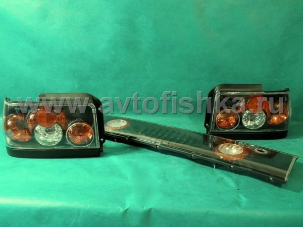 Toyota Corolla (92-97) фонари задние черные со средней накладкой, комплект 3 пр.