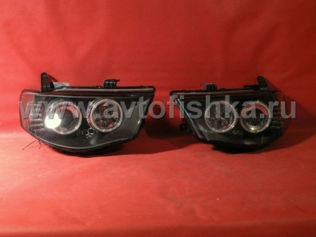 Mitsubishi L200 Triton (2005-) передние фары линзовые со светящимися ободками, черные, комплект 2 шт.