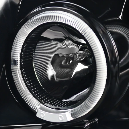 Nissan Pathfinder III, Navara (05-10) фары передние линзовые черные, со светящимися ободками, комплект 2 шт.