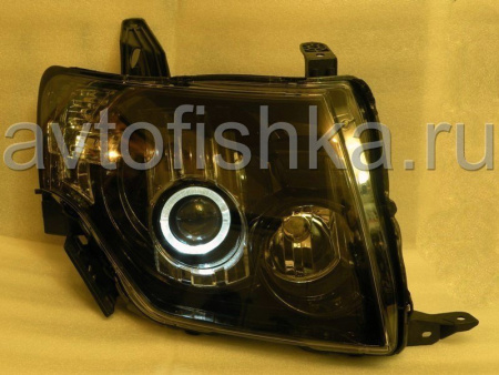 Mitsubishi Pajero 4 (2006-) фары передние линзовые черные со светящимися ободками под электрокорректор, комплект 2 шт.