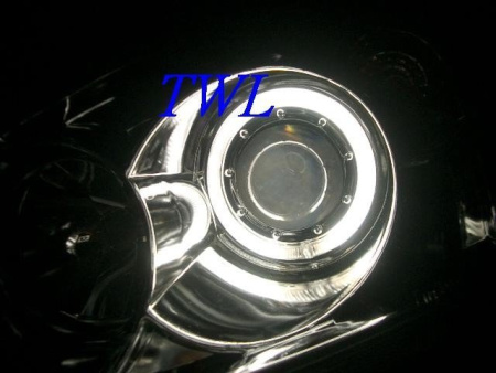 Mitsubishi Lancer 9 (03-07) фары передние линзовые хромированные, со светящимися ободками, комплект 2 шт.