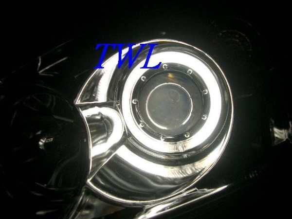 Mitsubishi Lancer 9 (03-07) фары передние линзовые хромированные, со светящимися ободками, комплект 2 шт.