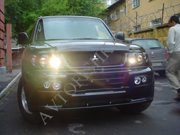 Mitsubishi PAJERO 3 (02-06) Фары DAKAR (комплект с креплениями) hella