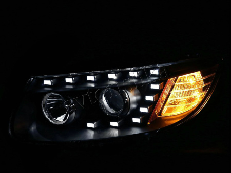 Hyundai Santa Fe (06-) линзовые передние фары, со светящимися ободками, с моторами корректора, тюнинговые, комплект 2 шт.