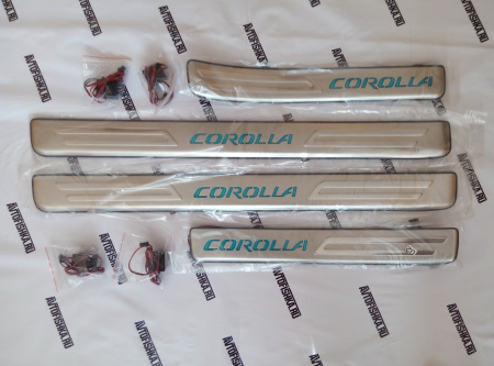 Toyota Corolla седан (01-06) накладки порогов дверных проемов из нержавеющей стали с подсветкой, комплект 4 шт.