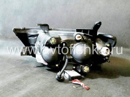 Mitsubishi L200 Triton (2005-) передние фары линзовые со светящимися ободками, черные, комплект 2 шт.