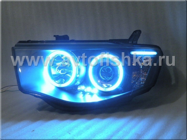 Mitsubishi L200 Triton (2005-) фары передние линзовые со светящимися ободками, черные, комплект 2 шт.
