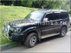 Toyota Land Cruiser Prado 90 (FJ90) (96-02) фары передние черные, со светящимися ободками, комплект 2 шт.
