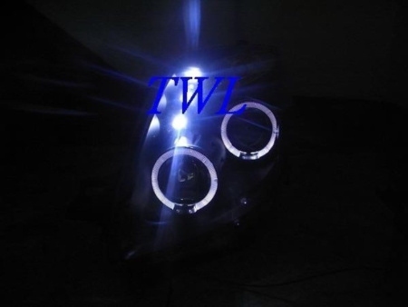 Toyota Yaris P2 (05-) передние линзовые фары хромированные, со светящимися ободками, комплект 2 шт.