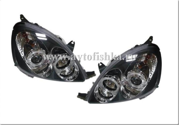 Toyota Yaris, Vitz (99-05) фары передние линзовые черные, со светящимися ободками, комплект 2 шт.