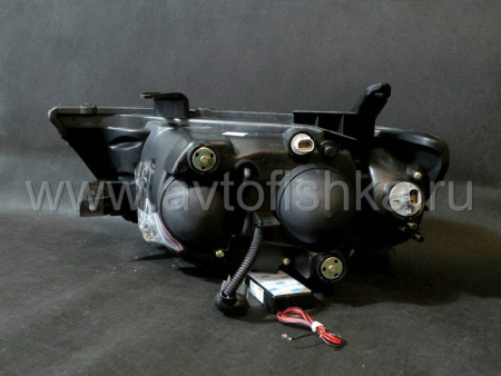 Mitsubishi L200 Triton (2005-) фары передние линзовые хромированные, со светящимися ободками, комплект 2 шт.