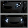 Toyota Yaris P2 (05-) передние фары линзовые черные, со светящимися ободками, комплект 2 шт.