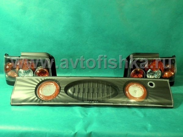 Toyota Corolla (92-97) фонари задние черные со средней накладкой, комплект 3 пр.