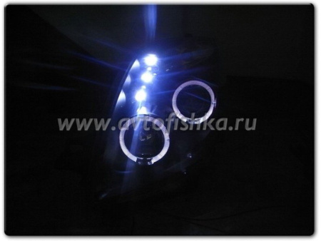 Toyota Yaris P2 (05-) передние фары линзовые черные, со светящимися ободками, комплект 2 шт.