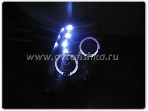 Toyota Yaris P2 (05-) передние фары линзовые черные, со светящимися ободками, комплект 2 шт.