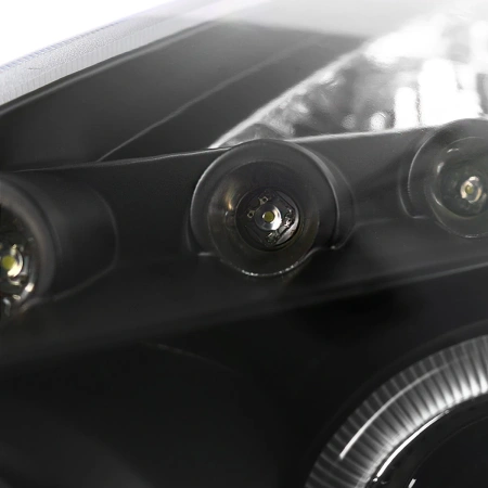 Toyota Celica 2000-2005 фары передние линзовые черные, со светящимися ободками LED