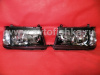 Toyota Land Cruiser 100 (98-05) фары передние черные глянцевые, с совмещенными поворотниками, комплект 2 шт.
