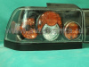 Toyota Corolla (92-97) фонари задние черные со средней накладкой, комплект 3 пр.