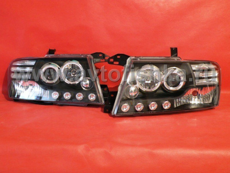Mitsubishi Pajero 3 (2000-2006) фары передние линзовые черные со светящимися ободками, комплект 2 шт.