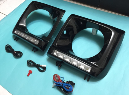 Mercedes G-class W463 (1989-2013) рамки передних фар с фонарями DRL, под покраску, полный установочный комплект