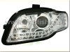 Audi A4 (05-07) передние фары линзовые хромированные, со светодиодной подсветкой, с электрокорректором, комплект 2 шт.