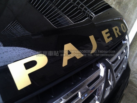 Наклейка Pajero на капот, буквы позолоченные металлизированные.