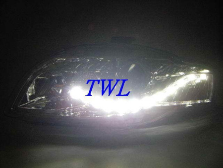 Audi A4 (05-07) фары передние линзовые хромированные, со светодиодной подсветкой, с электрокорректором, комплект 2 шт.