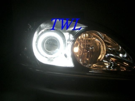 Mitsubishi Lancer 9 (03-07) фары передние линзовые хромированные, со светящимися ободками, комплект 2 шт.