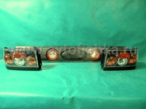 Toyota Corolla (92-97) фонари задние черные со средней накладкой, комплект 3 пр.