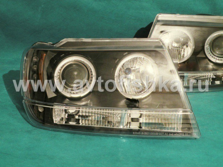 Jeep Grand Cherokee (99-04) передние фары линзовые черные, со светящимися ободками, комплект 2 шт.